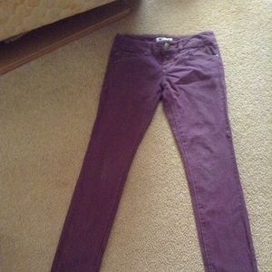 Purple pants with stripes